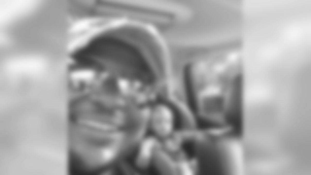 brandonw_66 [Brandon Williams]: Riding with my main man Ryder #WindowsDown #MusicUp #Animals (Don't worry I'm not driving while taking this photo) Just picked him up from daycare. #ChunckyCheeks #ChipmunkDoubleChin @alyssawylene