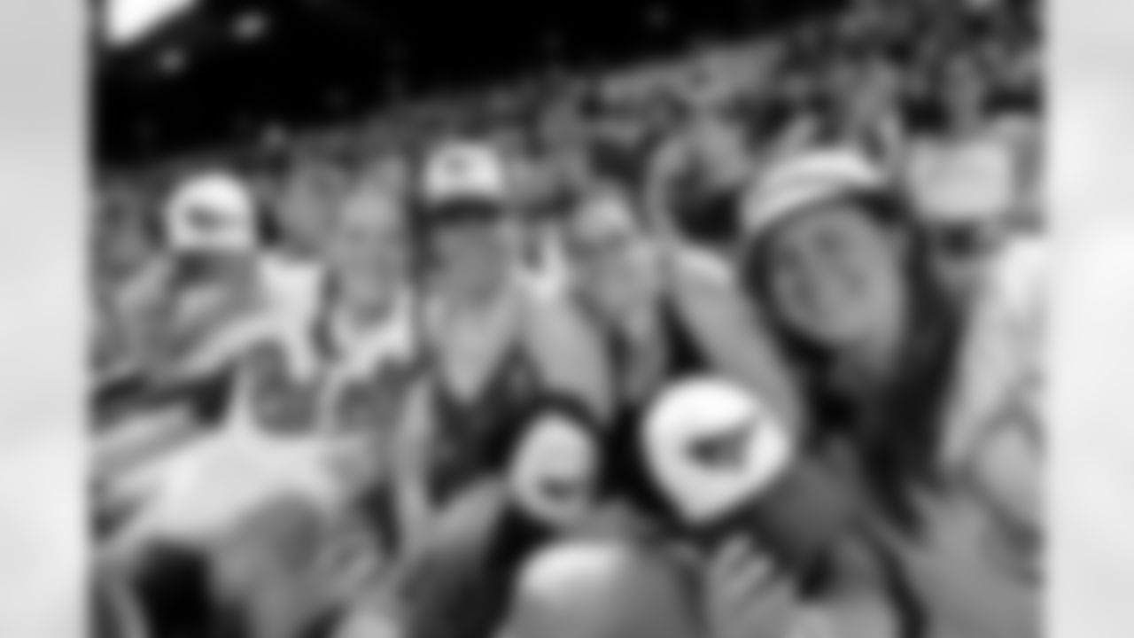 The Baltimore Ravens and Orioles partnered to present O's-Ravens Rally Night at Oriole Park at Camden Yards on Saturday, June 12. Ravens Head Coach John Harbaugh threw out the first pitch and the Ravens' mascot, Poe, cheerleaders and band, the Marching Ra
