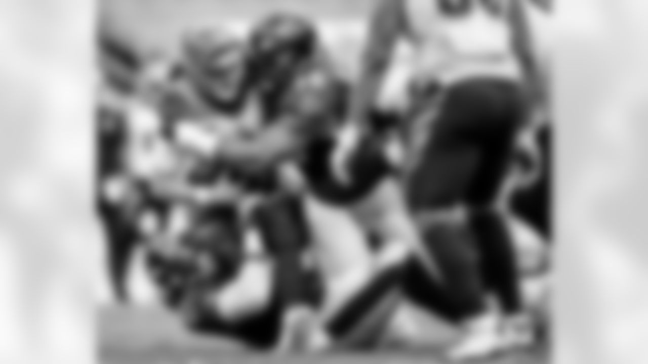DT Brandon Williams and LB Pernell McPhee sack Joe Burrow / The Baltimore Ravens defeated the Cincinnati Bengals by a score of 27-3 at M&T Bank Stadium on October 11, 2020 in Baltimore, MD.