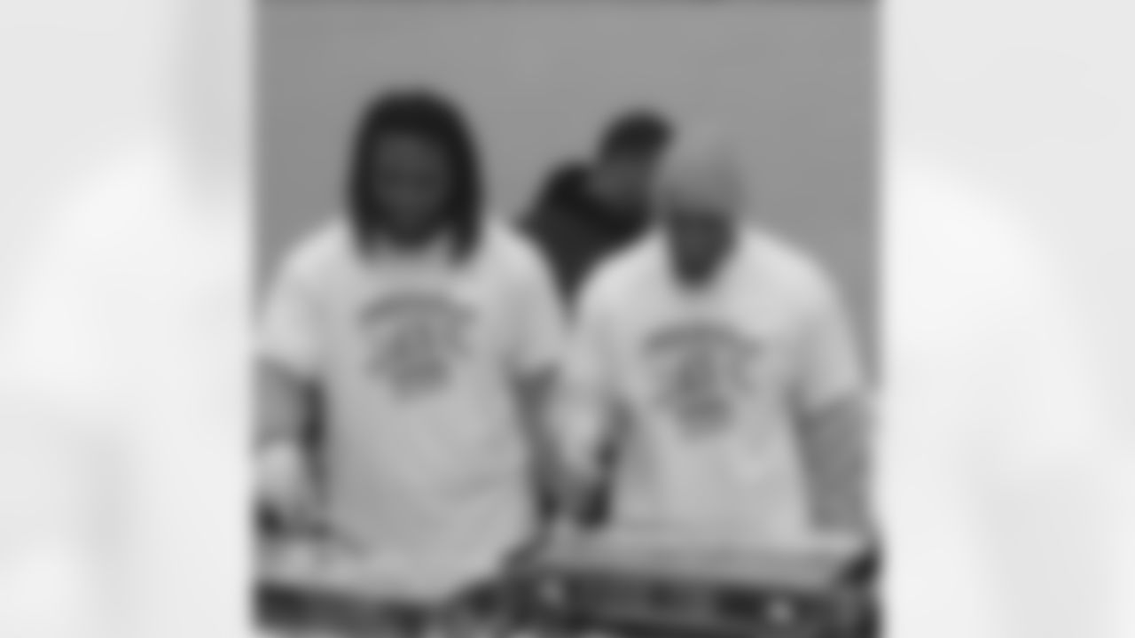 alevine41[Anthony Levine]:Me an my Boi @334upshaw41 yesterday #Feeding53Families supporting #JameelMcclain