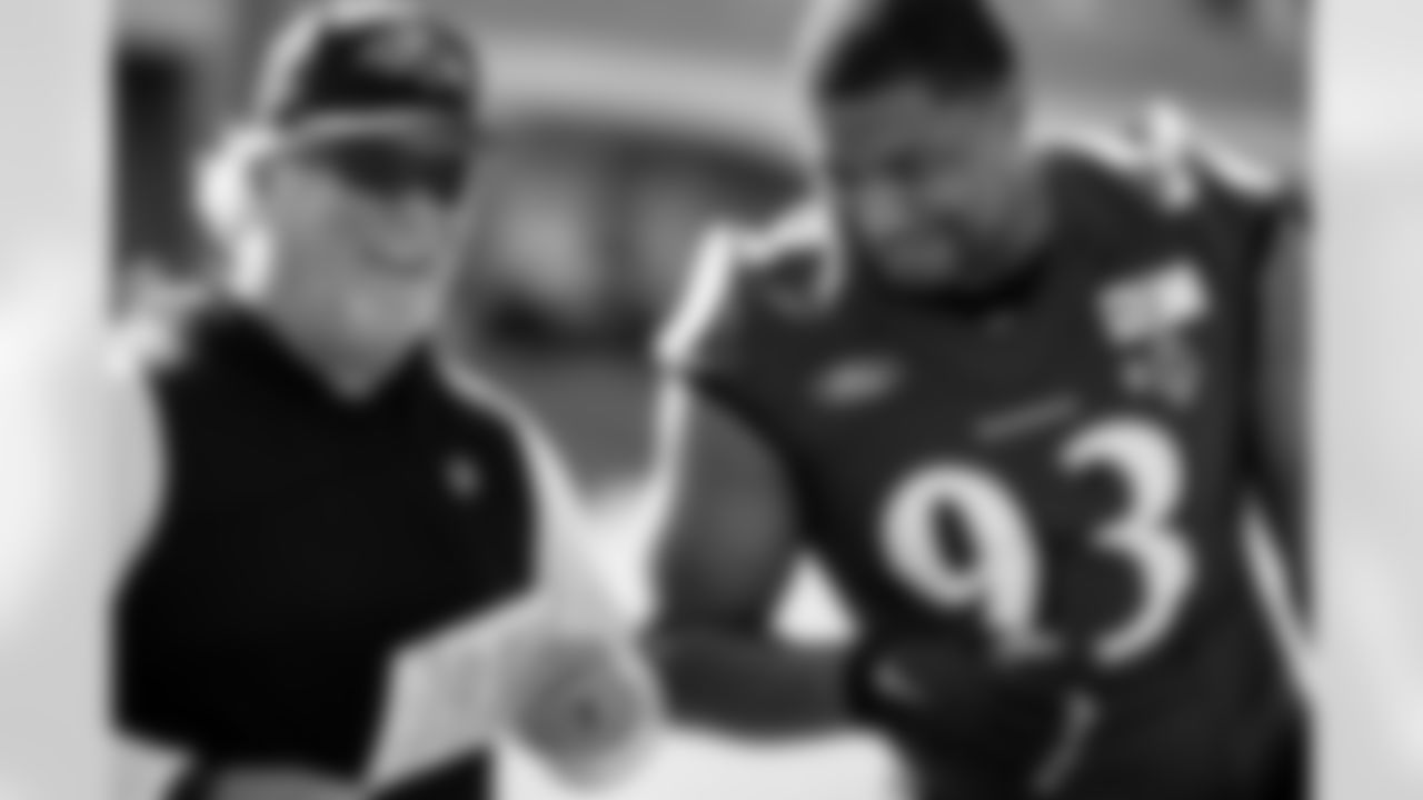 Left: Defensive Coordinator Don Martindale; Right: DE Calais Campbell