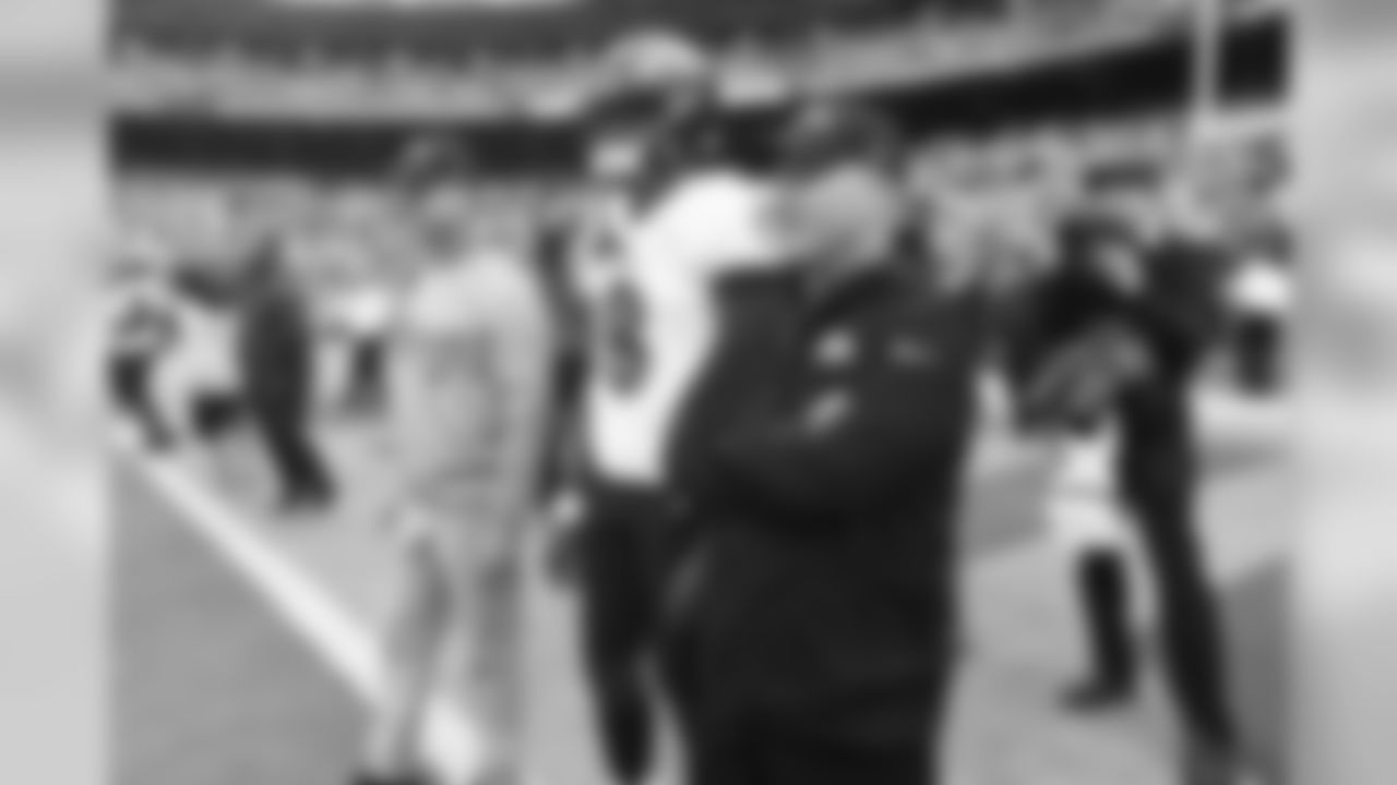 Head coach John Harbaugh, QB Lamar Jackson, QB coach James Urban