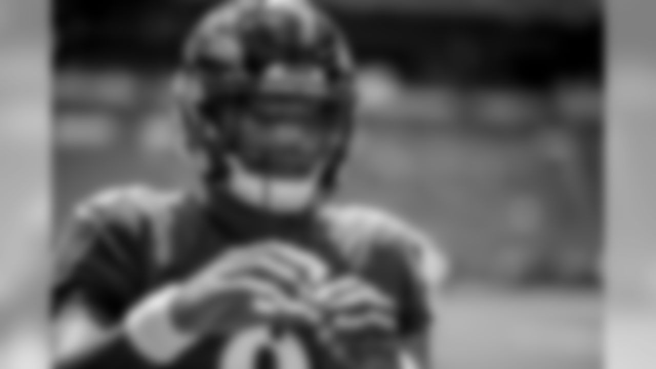 Quarterback Lamar Jackson warms up before the first regular season game against the Miami Dolphins on September 8, 2019.