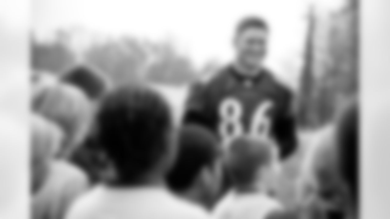 Todd Heap went to Elkridge Elementary School with new friend, fifth-grader Travis Justice, as part of the Take a Player to School program. Heap spoke to the students about the NFL's Play 60 campaign to stay active before heading out to the playground.