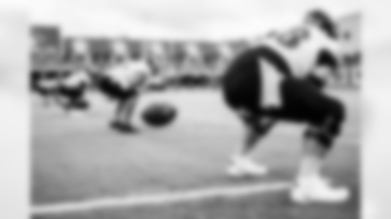 Centers practice their snaps