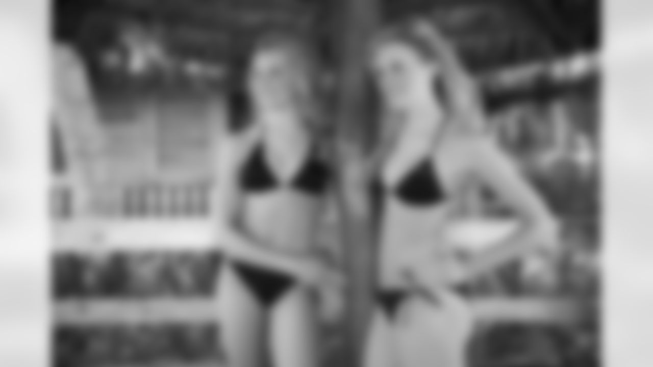 Twin sisters Chase and Paige pose together for their calendar shoot.