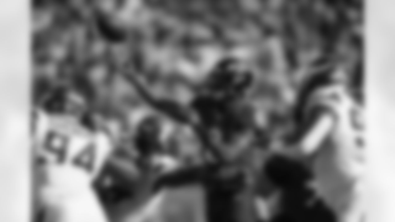 Baltimore Ravens quarterback Lamar Jackson (8) throws under pressure during the first half of an NFL football game against the Minnesota Vikings, Sunday, Nov. 7, 2021, in Baltimore.