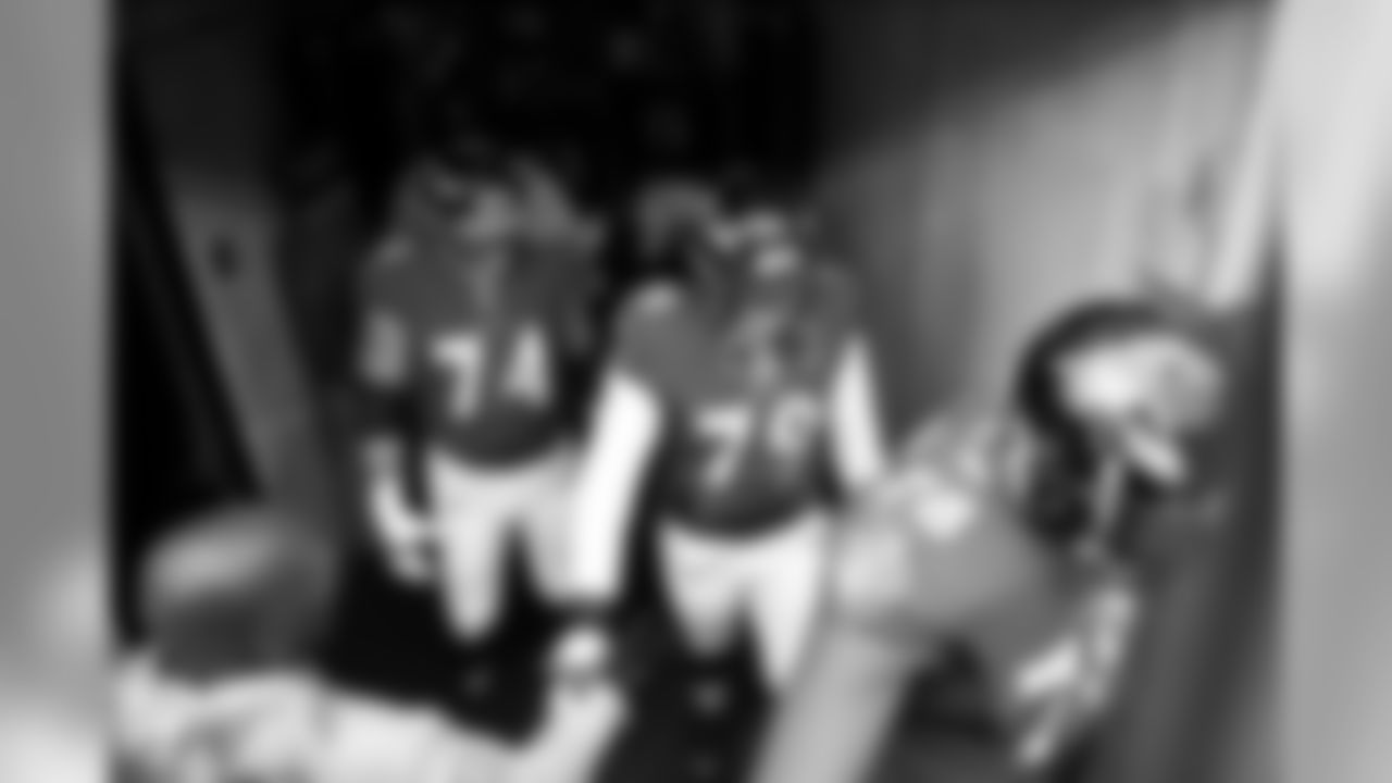 Baltimore Ravens offensive tackle James Hurst (74), offensive tackle Ronnie Stanley (79) and offensive tackle Orlando Brown (78) take the field prior to an NFL football game against the Houston Texans, Sunday, Nov. 17, 2019, in Baltimore. (AP Photo/Nick Wass)