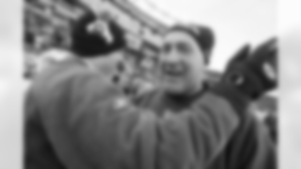 The Ravens celebrate their their historic 33-14 wild card win in New England. Head Coach John Harbaugh high-fived Ravens fans around the edge of the stadium before joining his team in the locker room.