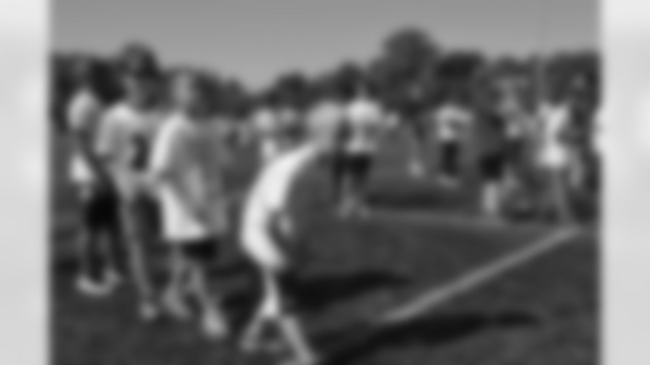 More than 700 children attended Ray Rice Day on Saturday, May 12, 2012. Rice was joined by Ravens teammates Anthony Allen, Torrey Smith and LaQuan Williams, who helped run the football camp.