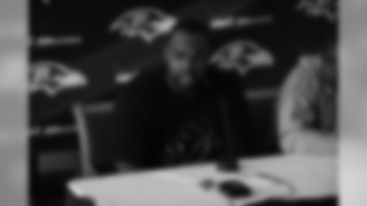 Tackle Michael Oher and General Manager & Executive VP Ozzie Newsome talk with the media during a press conference following the first-round draft pick's signing.