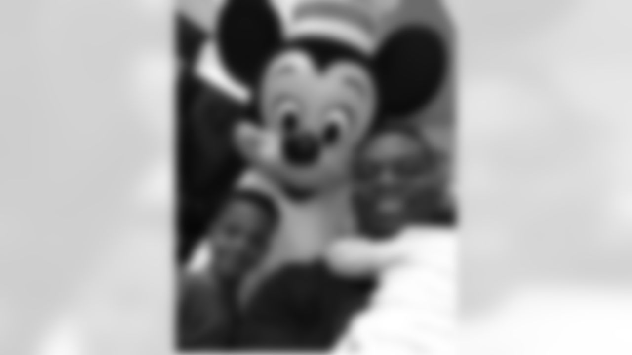benjaminswatson [Benjamin Watson]: The little one I'm holding wants no part of the big scary mouse. The little one looking had second thoughts as well. The big one looking feels like a kid again!