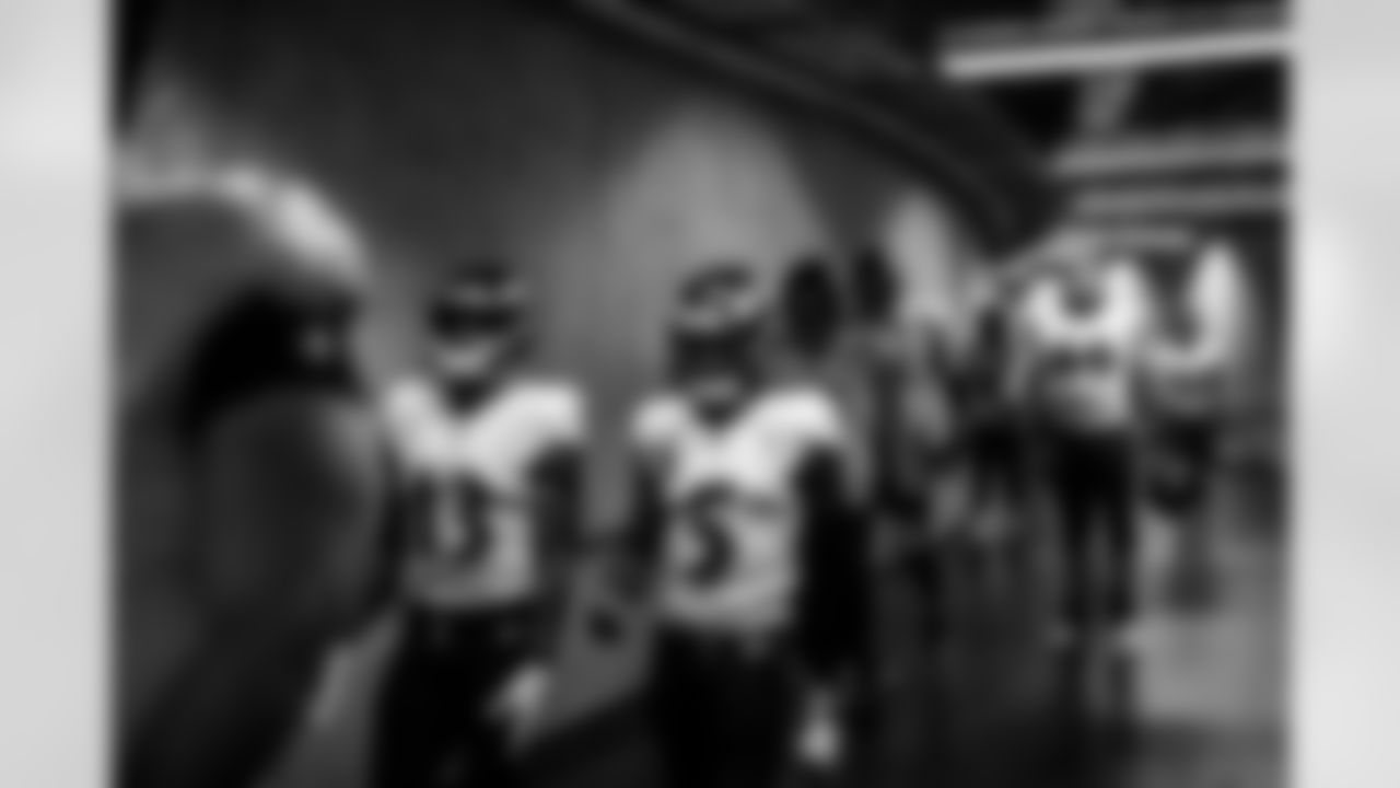 The team heads towards the field