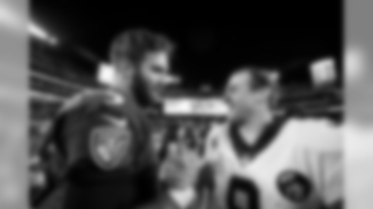 QB Joe Flacco and QB Drew Brees