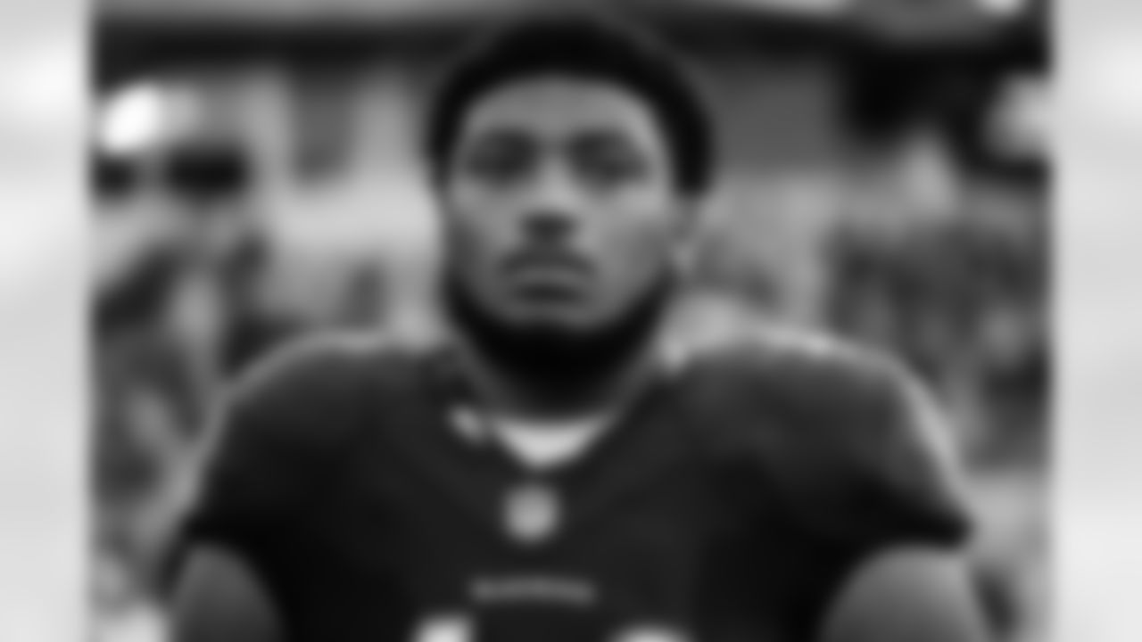 ILB Malik Harrison (40) during the national anthem before a game against the New Orleans Saints at M&T Bank Stadium on August 14, 2021.