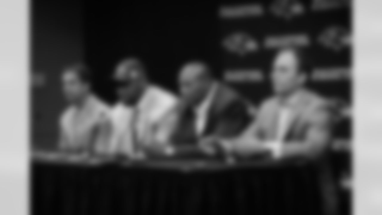 2009 Ravens first-round draft pick Michael Oher is introduced by GM Ozzie Newsome, Head Coach John Harbaugh and Director of Player Personnel Eric DeCosta at a press conference at the Ravens' Owings Mills Training Facility in April 2009.