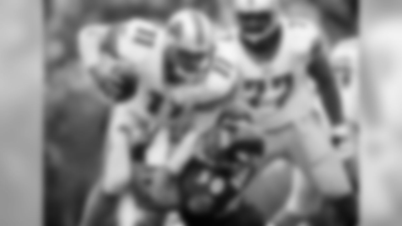 Images from the Ravens' 48-3 rout over the visiting Detroit Lions. The Ravens set multiple franchise records, including most rushing touchdowns and most offensive total yards in a single game.