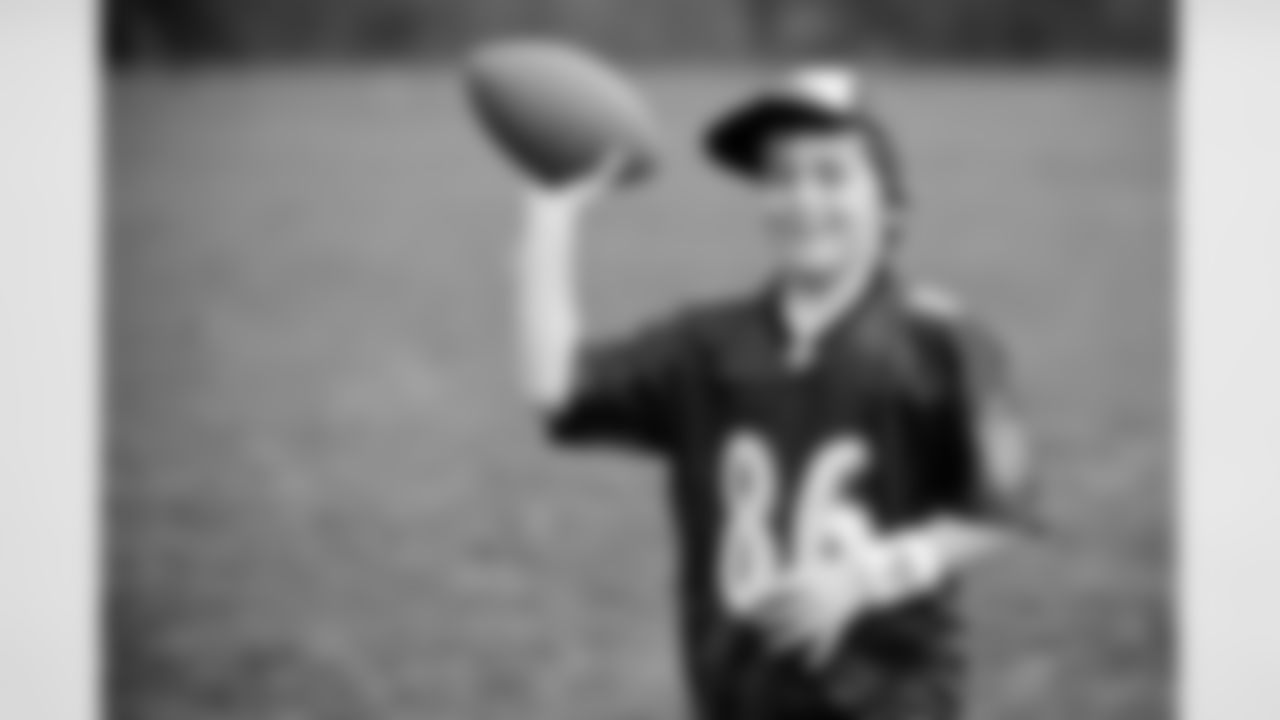 Todd Heap went to Elkridge Elementary School with new friend, fifth-grader Travis Justice, as part of the Take a Player to School program. Heap spoke to the students about the NFL's Play 60 campaign to stay active before heading out to the playground.