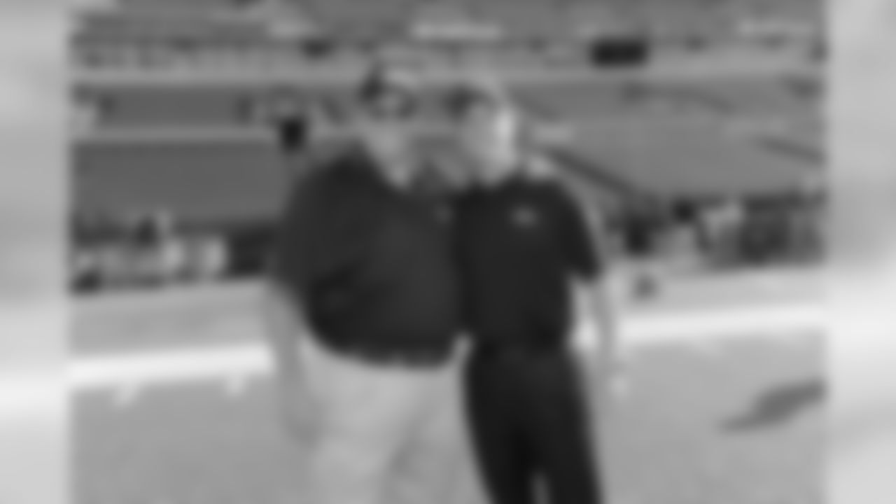 Ravens head coach John Harbaugh meets former Ravens defensive coordinator and new head coach Rex Ryan before the start of the game.
