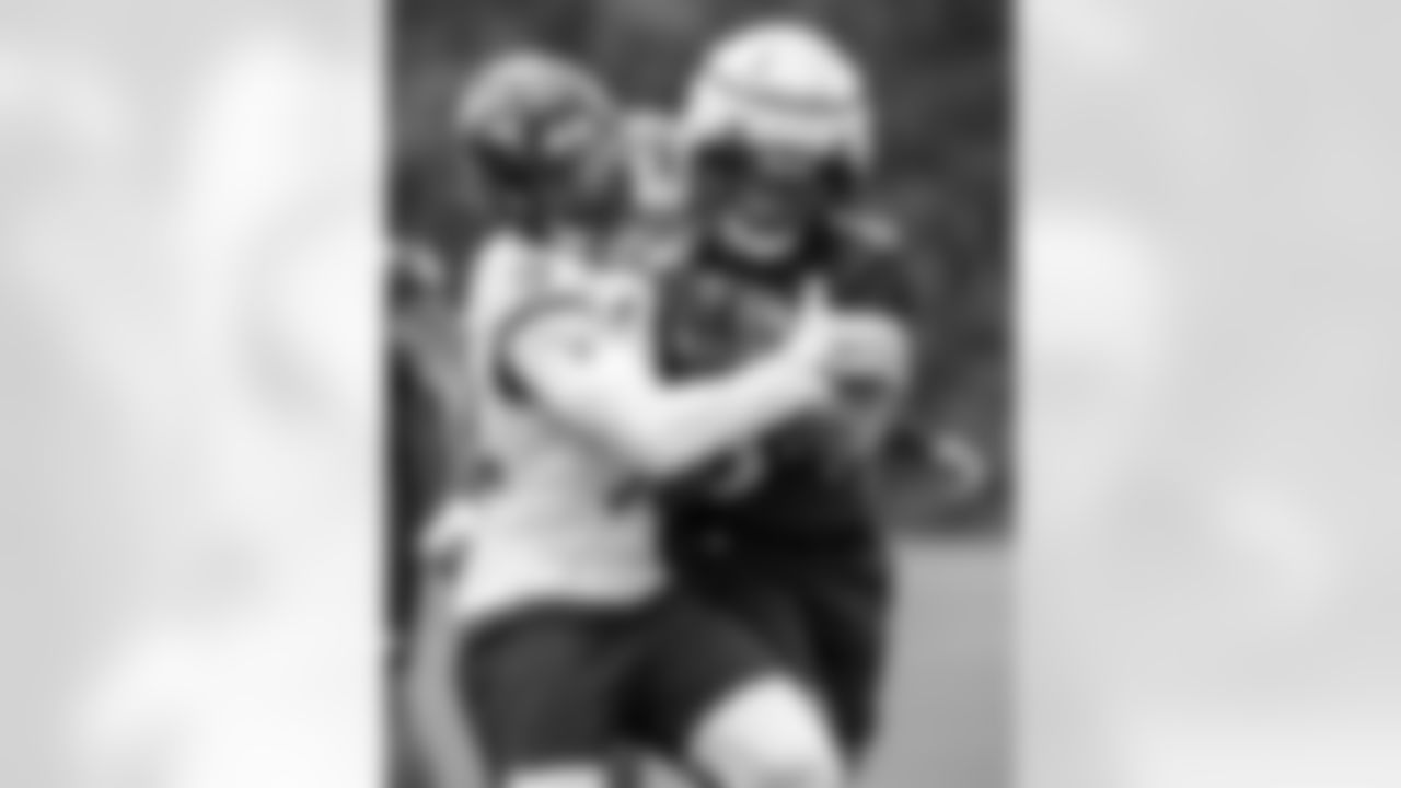 From left: S Marcus Williams, RB Keaton Mitchell