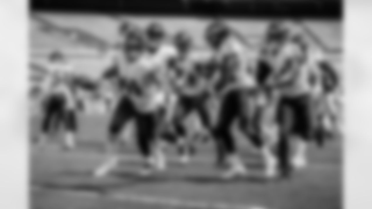 DB/LB Anthony Levine Sr. and the defense celebrate a fumble recovery