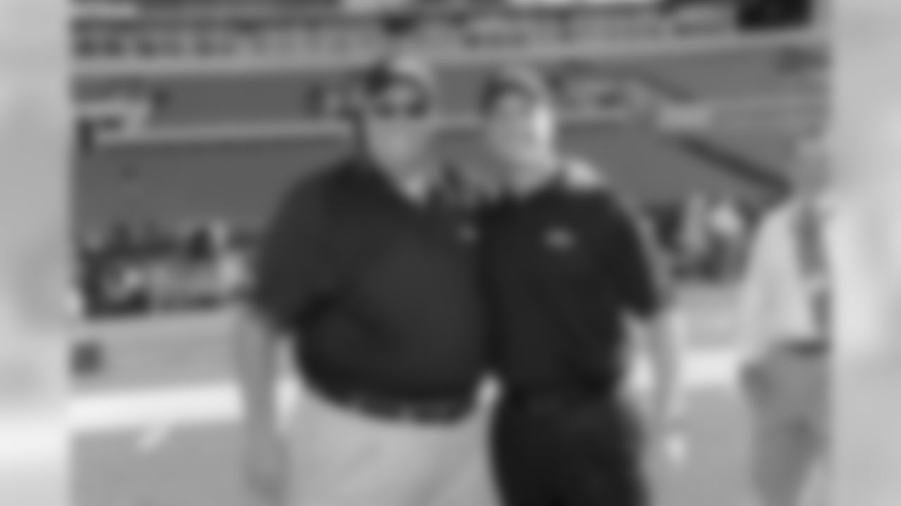 Ravens head coach John Harbaugh meets former Ravens defensive coordinator and new head coach Rex Ryan before the start of the game.