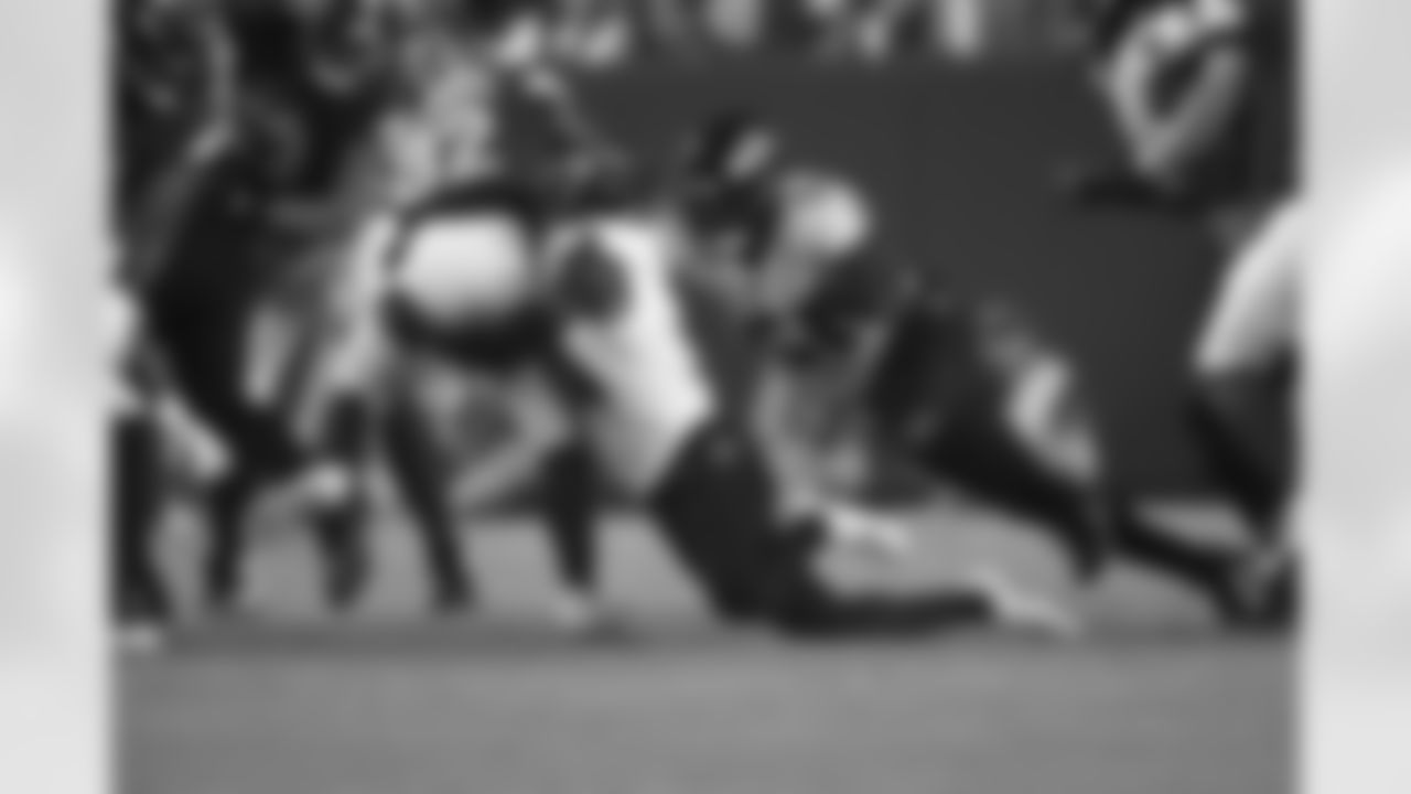Ravens players in action