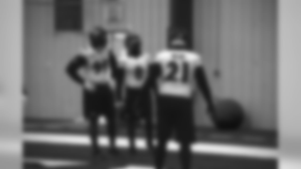 Chris Canty wears his own #99 jersey while Arthur Jones sports former Raven Curtis Painter's #8 and Haloti Ngata wears Lardarius Webb's #21.