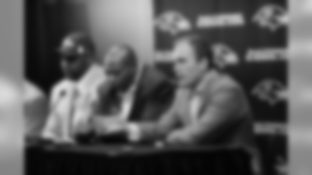 2009 Ravens first-round draft pick Michael Oher is introduced by GM Ozzie Newsome, Head Coach John Harbaugh and Director of Player Personnel Eric DeCosta at a press conference at the Ravens' Owings Mills Training Facility in April 2009.