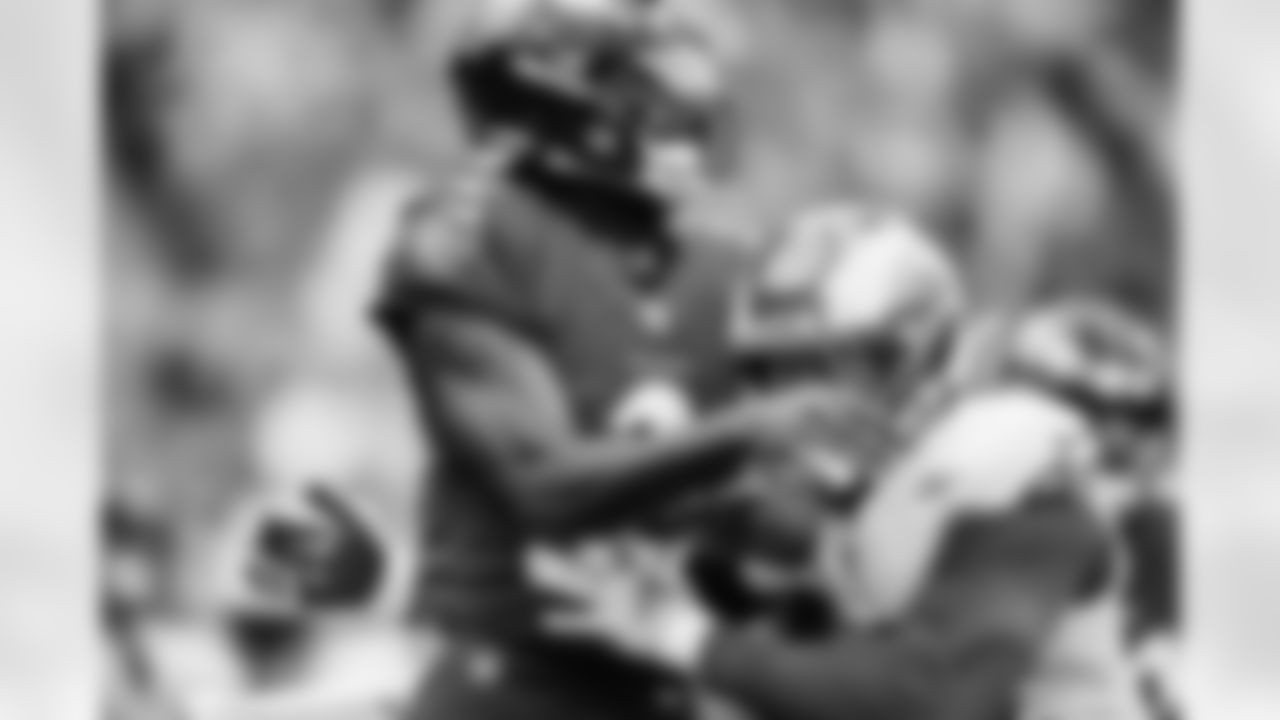 QB Tyler Huntley (2) gets hit during a game against the Los Angeles Rams at M&T Bank Stadium on January 2, 2022.