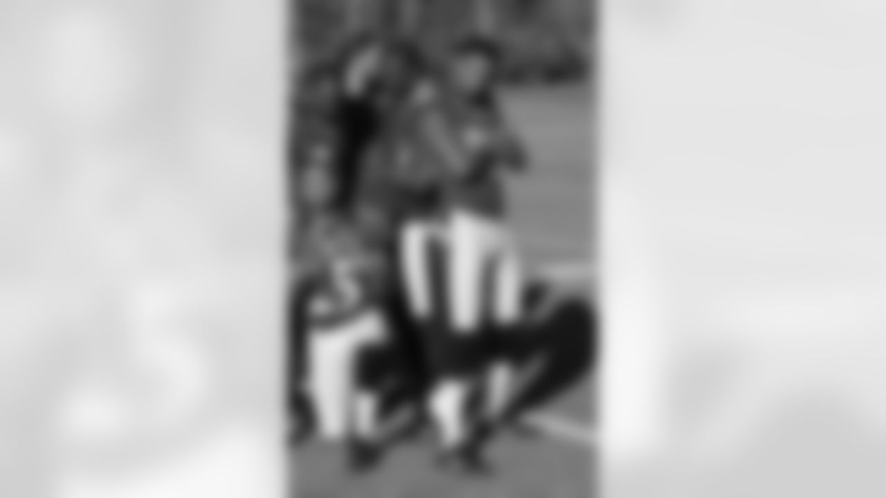 Jimmy Smith striking a pose during the defense backs photo.
