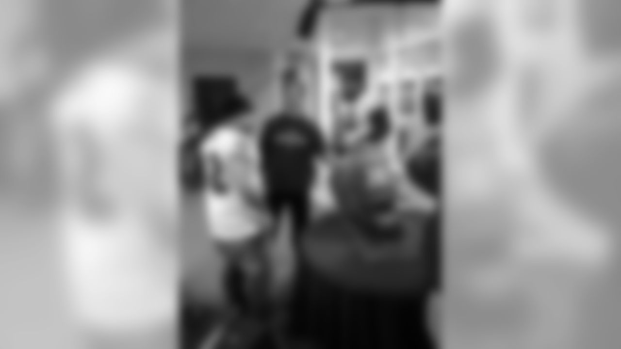 Duff Goldman of the Food Network's Ace of Cakes and Haloti Ngata paired up to make a Ravens cake with the bakers at Charm City Cakes in Baltimore.