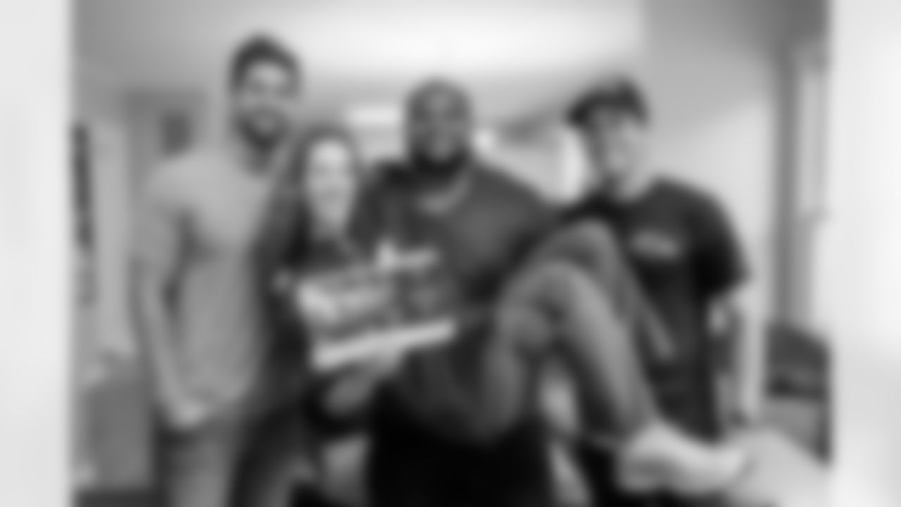 Poe, the Baltimore Ravens cheerleaders and the Ravens pep band made themselves at home at Richard & Lorren Rapkin's house during a surprise season ticket home delivery!
