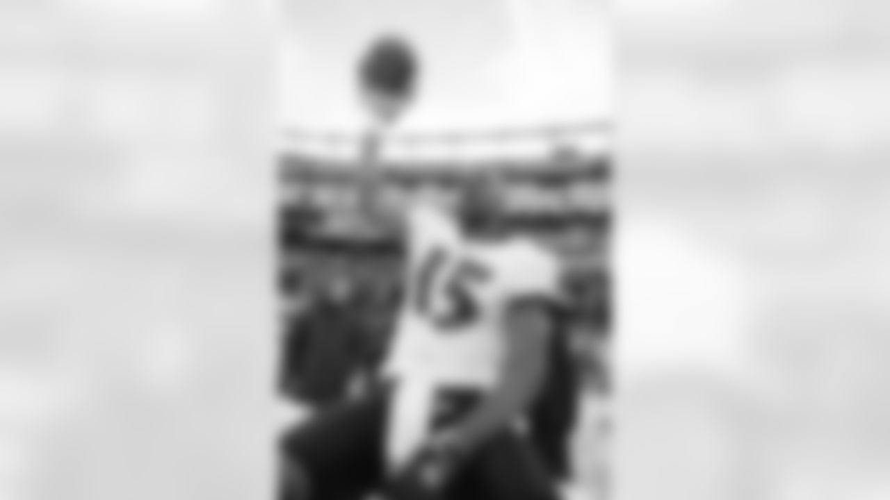 The Ravens celebrate their their historic 33-14 wild card win in New England. Head Coach John Harbaugh high-fived Ravens fans around the edge of the stadium before joining his team in the locker room.