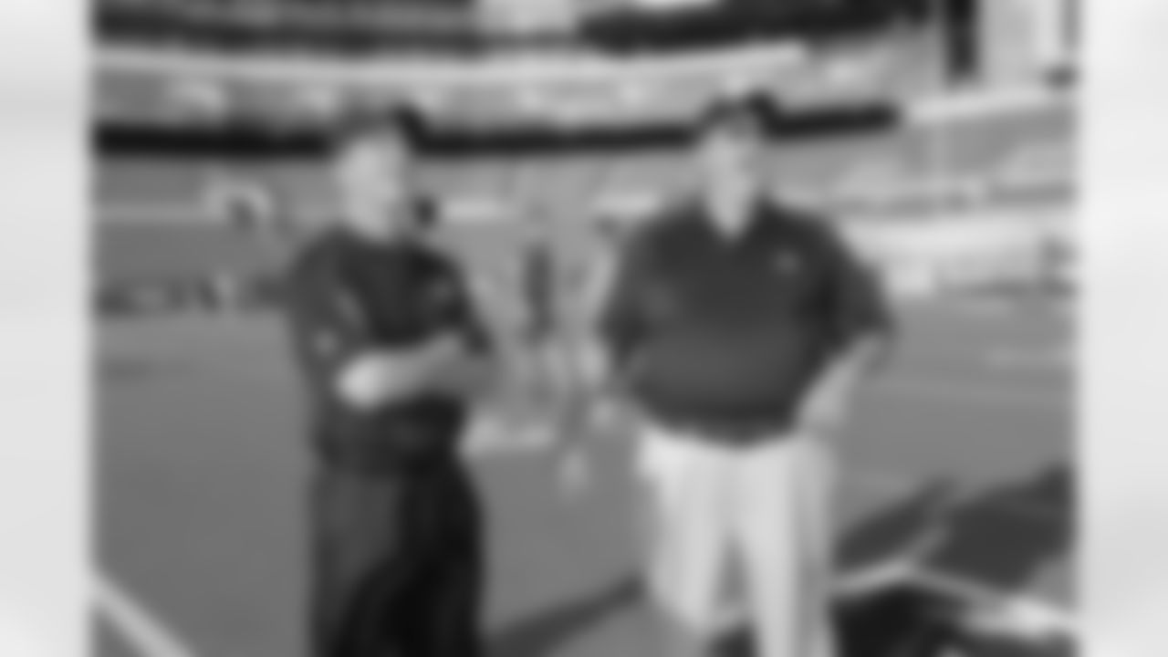 Ravens head coach John Harbaugh meets former Ravens defensive coordinator and new head coach Rex Ryan before the start of the game.