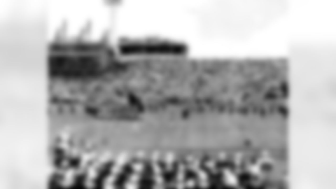 1953: The NFL's Dallas Texans relocate to Baltimore and assume the name Baltimore Colts. The blue and white colors of the new colts are the former colors of the Texans. The band is adopted by the new team.