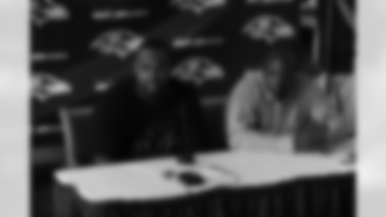 Tackle Michael Oher and General Manager & Executive VP Ozzie Newsome talk with the media during a press conference following the first-round draft pick's signing.