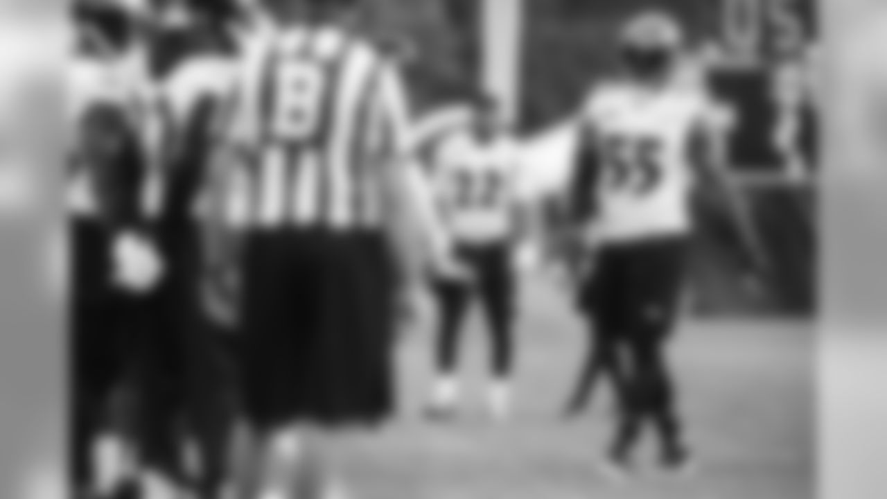 July 31, 2018. Baltimore Ravens Training Camp. Sponsor signage, vendors, fans, end of practice players.