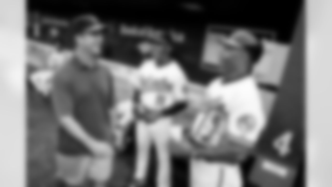 The Baltimore Ravens and Orioles partnered to present O's-Ravens Rally Night at Oriole Park at Camden Yards on Saturday, June 12. Ravens Head Coach John Harbaugh threw out the first pitch and the Ravens' mascot, Poe, cheerleaders and band, the Marching Ra