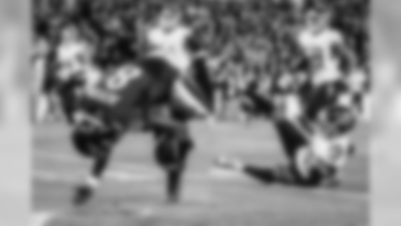 Quarterback Lamar Jackson tumbles to the ground in the divisional playoff game against the Tennessee Titans on January 11, 2019.