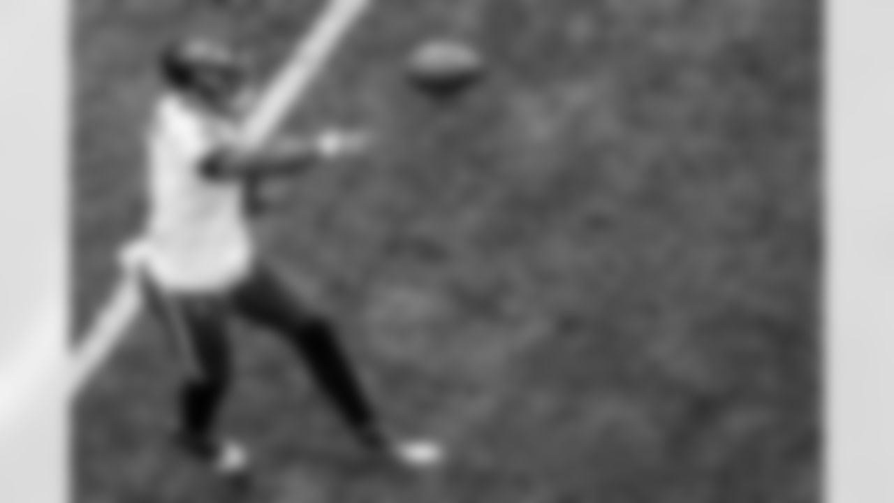 QB Lamar Jackson throws a touchdown pass