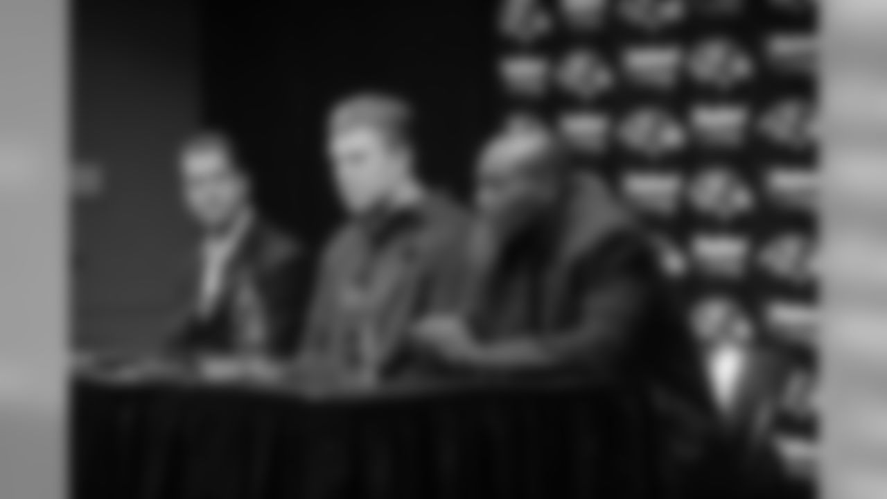 New Ravens center Matt Birk is joined by his family as he is introduced at a press conference by general manager Ozzie Newsome and head coach John Harbaugh in March 2009.