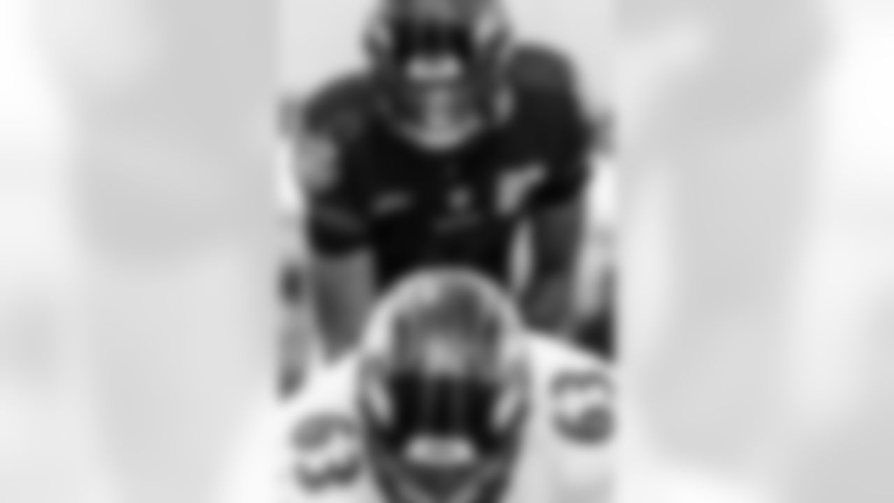 QB Lamar Jackson and C Trystan Colon.