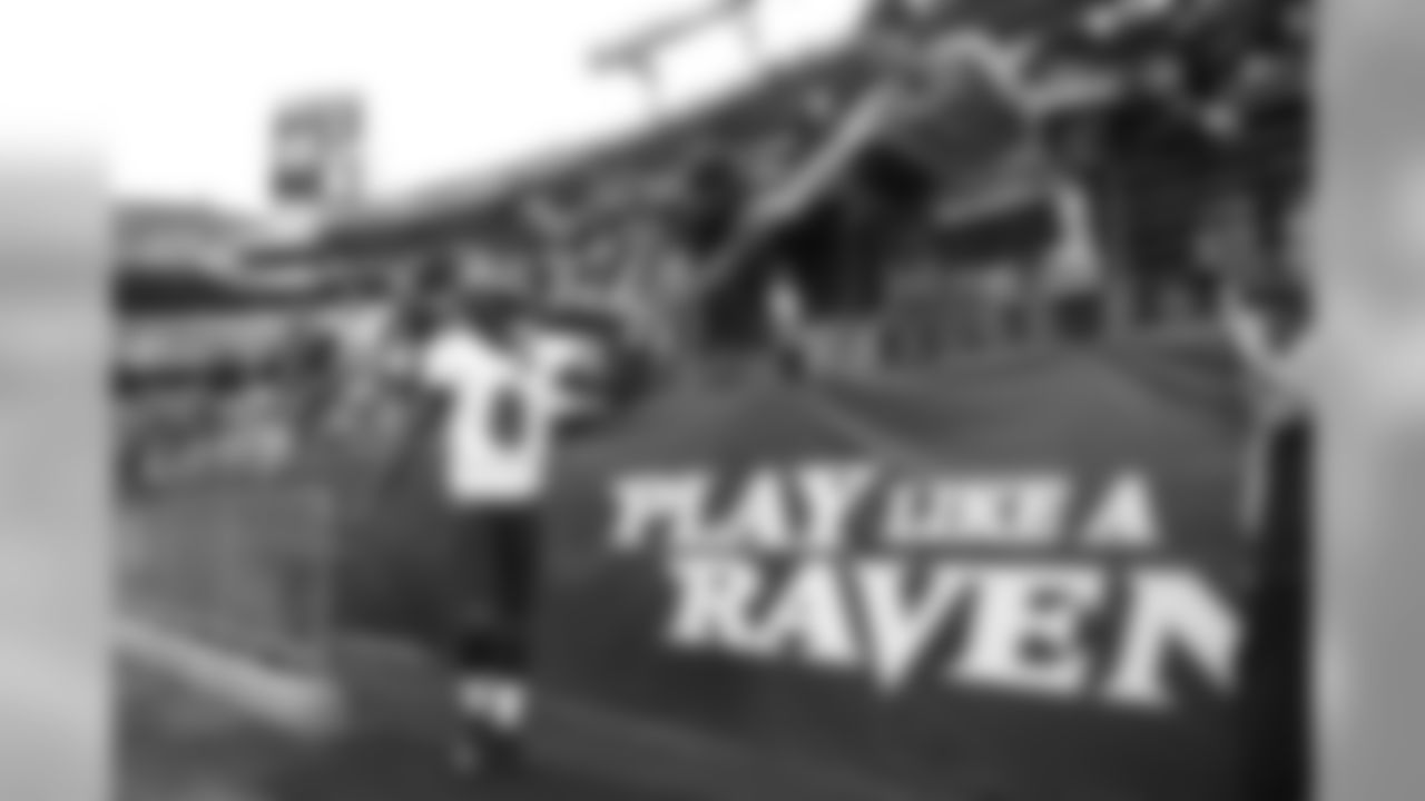 Baltimore Ravens quarterback Lamar Jackson takes the field prior to a NFL football preseason game against the Green Bay Packers, Thursday, Aug. 15, 2019, in Baltimore. (AP Photo/Nick Wass)