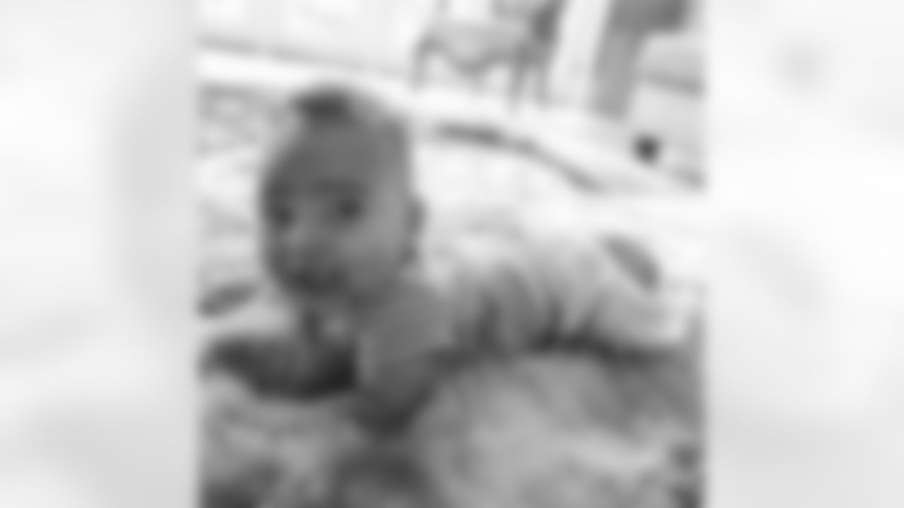 eugenemonroe60 [Eugene Monroe]: That boy is READY! Rolling over as happy as can be #love #family #fatherhood #nfl #dmv #baltimore #ravens