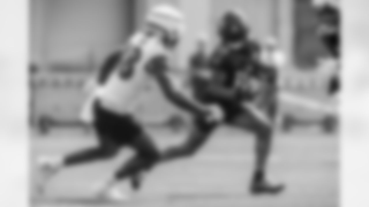 From left: OLB Jeremiah Moon, WR James Proche II