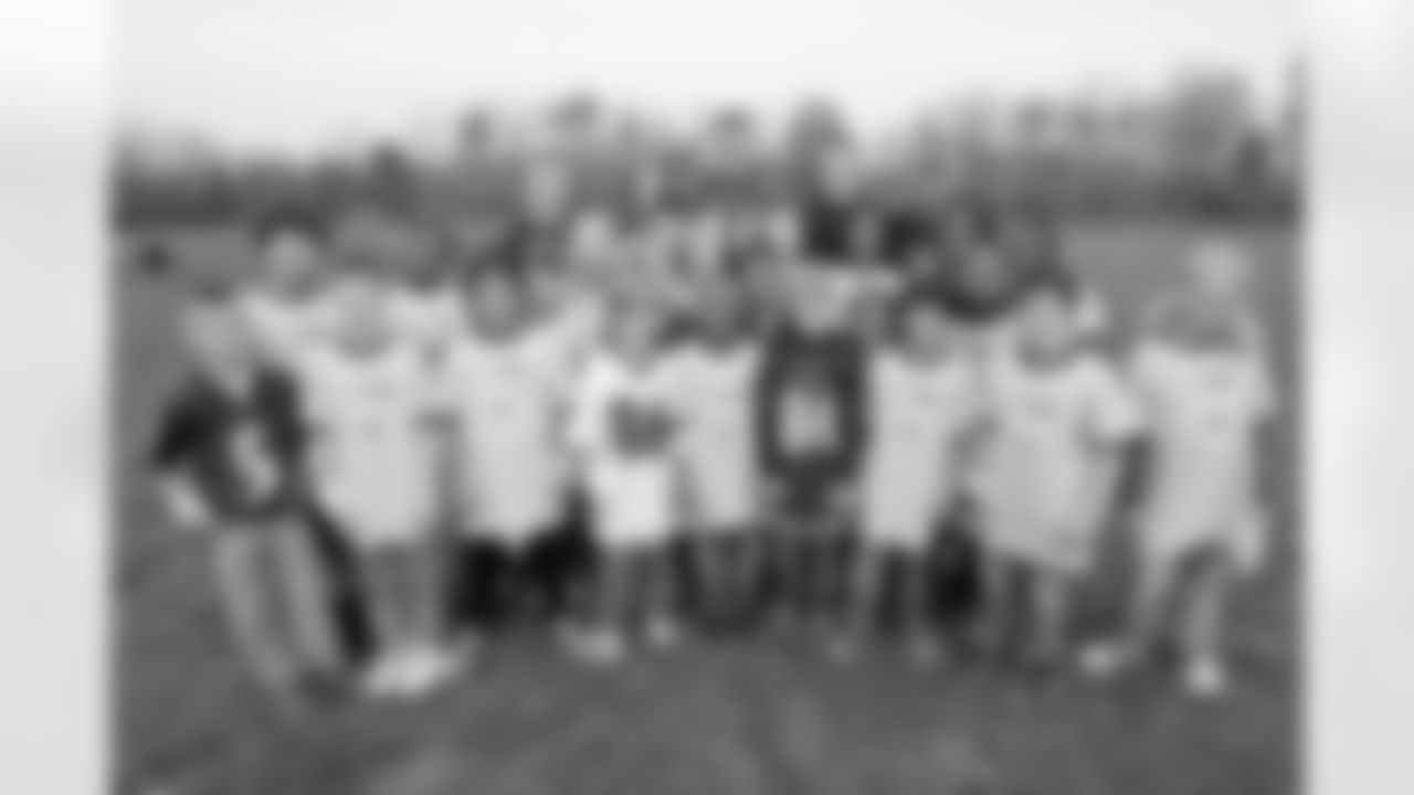 Todd Heap went to Elkridge Elementary School with new friend, fifth-grader Travis Justice, as part of the Take a Player to School program. Heap spoke to the students about the NFL's Play 60 campaign to stay active before heading out to the playground.