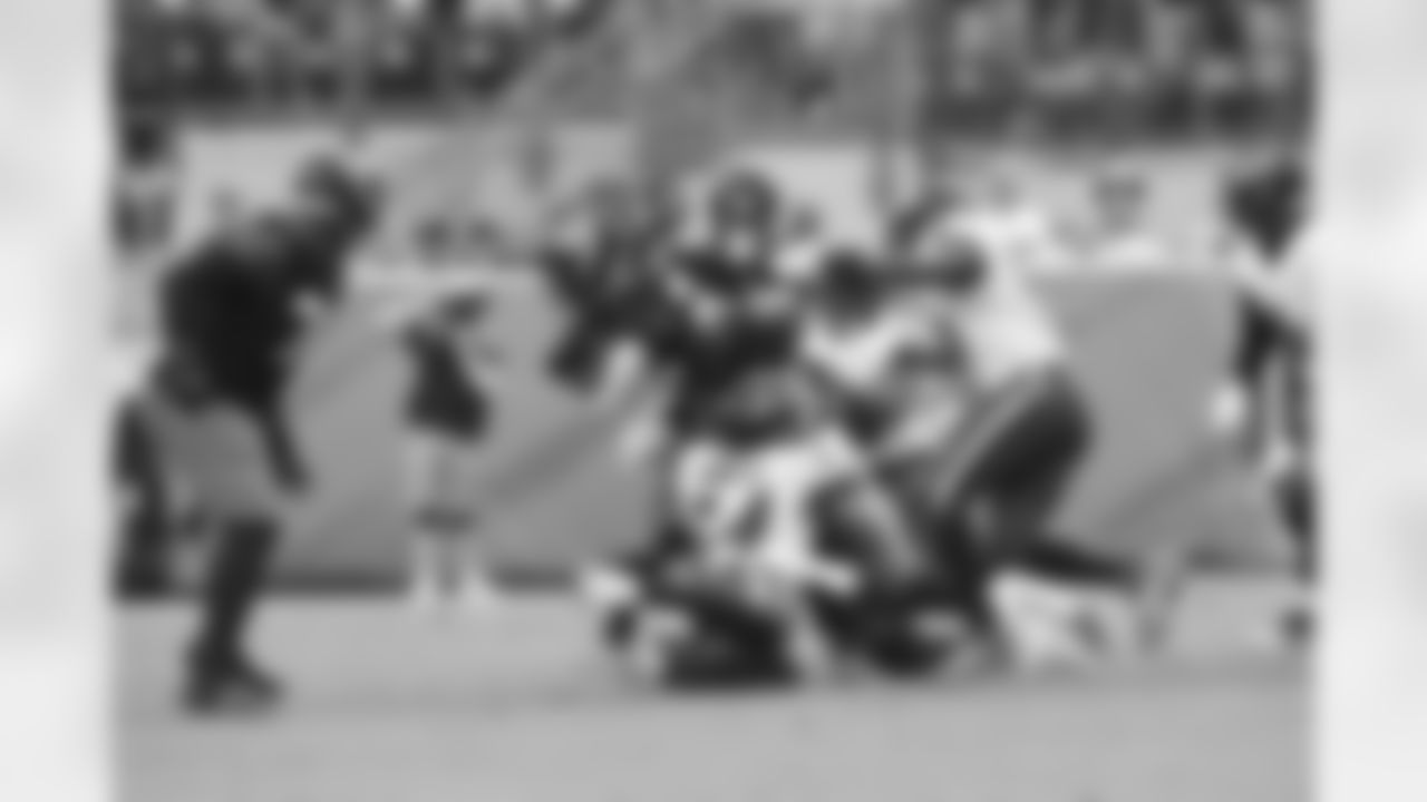 Ravens players in action