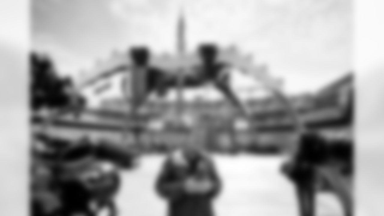 Workers build the unique stage for U2's 360-Degree Tour at M&T Bank Stadium.