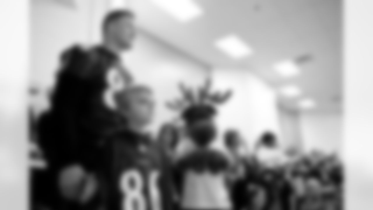 Todd Heap went to Elkridge Elementary School with new friend, fifth-grader Travis Justice, as part of the Take a Player to School program. Heap spoke to the students about the NFL's Play 60 campaign to stay active before heading out to the playground.